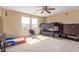 bedroom features a ceiling fan, bunk bed, and Paw Patrol decor at 3209 W Apollo Rd, Phoenix, AZ 85041