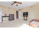 Cozy bedroom comes complete with a ceiling fan and themed decor at 3209 W Apollo Rd, Phoenix, AZ 85041