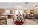 This open dining area features a table with seating for six at 3209 W Apollo Rd, Phoenix, AZ 85041