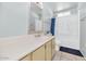 Bathroom with tub, vanity, and window at 3536 W Acapulco Ln, Phoenix, AZ 85053