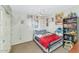 Bedroom with a bed, dresser, and shelving at 3536 W Acapulco Ln, Phoenix, AZ 85053