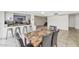 Dining area with table and chairs, open to the kitchen at 3536 W Acapulco Ln, Phoenix, AZ 85053