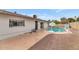 Backyard pool with patio and basketball hoop at 3536 W Acapulco Ln, Phoenix, AZ 85053