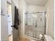 Clean bathroom with shower and plenty of storage at 356 S Felspar Dr, Apache Junction, AZ 85119