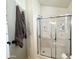 Clean bathroom with shower and plenty of storage at 356 S Felspar Dr, Apache Junction, AZ 85119