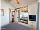 Bedroom with mirrored closet and access to kitchen at 356 S Felspar Dr, Apache Junction, AZ 85119