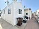 Mobile home exterior with covered patio and side yard at 356 S Felspar Dr, Apache Junction, AZ 85119