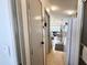 Hallway view of kitchen and living room at 356 S Felspar Dr, Apache Junction, AZ 85119