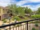 Exterior view from balcony showcasing the community's landscaped common areas and walkways at 3935 E Rough Rider Rd # 1191, Phoenix, AZ 85050