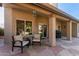 Relaxing patio with flagstone flooring and seating area at 4220 E Thistle Landing Dr, Phoenix, AZ 85044