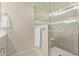 Spa-like shower with glass enclosure and tile surround at 4220 E Thistle Landing Dr, Phoenix, AZ 85044