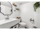 Modern bathroom with white vanity and stylish mirror at 4334 N 19Th Dr, Phoenix, AZ 85015