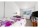 Bedroom with floral bedding and a view of the neighborhood at 4334 N 19Th Dr, Phoenix, AZ 85015