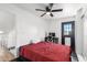 Cozy bedroom with a red bedspread and home office at 4334 N 19Th Dr, Phoenix, AZ 85015