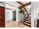 Entryway with wooden staircase and dark front door at 4334 N 19Th Dr, Phoenix, AZ 85015