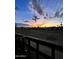 Stunning sunset view from a balcony overlooking a park-like setting at 4334 N 19Th Dr, Phoenix, AZ 85015