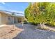 Landscaped backyard with gravel and mature trees at 4725 E Capri Ave, Mesa, AZ 85206