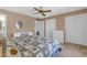 Bright bedroom with a king-size bed and ample closet space at 4725 E Capri Ave, Mesa, AZ 85206