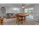 Casual dining area with a wood table and chairs, near the living room at 4725 E Capri Ave, Mesa, AZ 85206