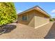 Brick exterior of the home with a tree in the front at 4725 E Capri Ave, Mesa, AZ 85206