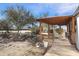 Covered patio with wooden beams, and a walkway at 49201 N 24Th Ave, New River, AZ 85087