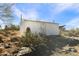 White metal storage shed in desert landscape at 49201 N 24Th Ave, New River, AZ 85087