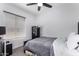 Bedroom with gray walls, carpet, window and a ceiling fan at 5114 W Corrine Dr, Glendale, AZ 85304