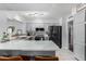 Bright kitchen features gray cabinets, stainless steel appliances, subway tile backsplash and a quartz counter at 5114 W Corrine Dr, Glendale, AZ 85304