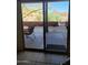 Covered patio with desert views and space for outdoor seating at 55823 N 329Th Dr, Wickenburg, AZ 85390