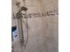 Close up of a beautifully tiled shower with updated fixtures and features at 55823 N 329Th Dr, Wickenburg, AZ 85390