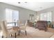 Elegant dining room with a round table and four chairs at 5613 N Laguna Ct, Litchfield Park, AZ 85340