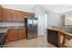 Kitchen with stainless steel appliances and granite counters at 5613 N Laguna Ct, Litchfield Park, AZ 85340