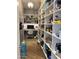 Bright and spacious pantry with ample shelving at 6922 E Cactus Wren Rd, Paradise Valley, AZ 85253