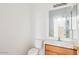 Small bathroom with single sink vanity and mirror at 7411 W Alta Vista Rd, Laveen, AZ 85339