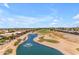 Aerial view of homes near golf course and lake at 789 E Blossom Rd, San Tan Valley, AZ 85143