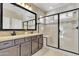 Spa-like bathroom with double vanity and large shower at 789 E Blossom Rd, San Tan Valley, AZ 85143