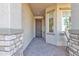 Front entryway with a dark wood door and stone accents at 789 E Blossom Rd, San Tan Valley, AZ 85143