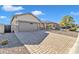 Front view of a house with a paved driveway at 789 E Blossom Rd, San Tan Valley, AZ 85143