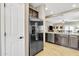 Kitchen with stainless steel refrigerator and pantry at 789 E Blossom Rd, San Tan Valley, AZ 85143