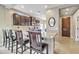 Kitchen with granite countertops and dark wood cabinets at 789 E Blossom Rd, San Tan Valley, AZ 85143