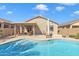 Inviting kidney-shaped pool and spacious patio at 789 E Blossom Rd, San Tan Valley, AZ 85143