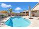 Inviting kidney-shaped pool with a patio and lounge area at 789 E Blossom Rd, San Tan Valley, AZ 85143