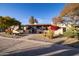 Attractive front yard with desert landscaping and a paved walkway at 8502 E Country Club Trl, Scottsdale, AZ 85255