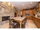 Gourmet kitchen boasts granite countertops and wood cabinetry at 8502 E Country Club Trl, Scottsdale, AZ 85255