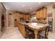 Spacious kitchen with granite island and double ovens at 8502 E Country Club Trl, Scottsdale, AZ 85255