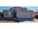 Single-story house with a two-car garage and small front yard at 9215 W Sandra Ter, Peoria, AZ 85382