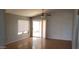 Bright living room with wood flooring and sliding glass doors at 9215 W Sandra Ter, Peoria, AZ 85382