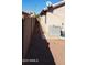 Side yard with gravel and AC unit at 9215 W Sandra Ter, Peoria, AZ 85382