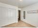 Bedroom with double door closet and mirror at 937 N Kingston St, Gilbert, AZ 85233