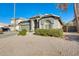 Single story home with a two-car garage and neatly landscaped yard at 937 N Kingston St, Gilbert, AZ 85233